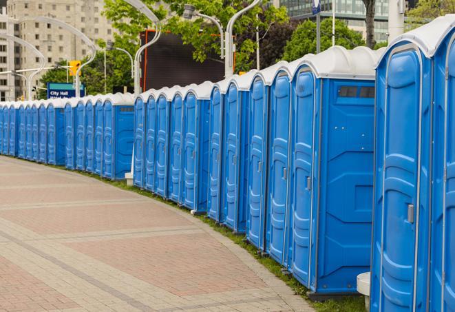 a row of portable restrooms at a fairground, offering visitors a clean and hassle-free experience in noxie